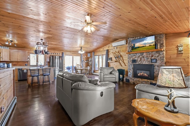 living room featuring a stone fireplace, dark hardwood / wood-style floors, wooden walls, lofted ceiling, and a baseboard heating unit