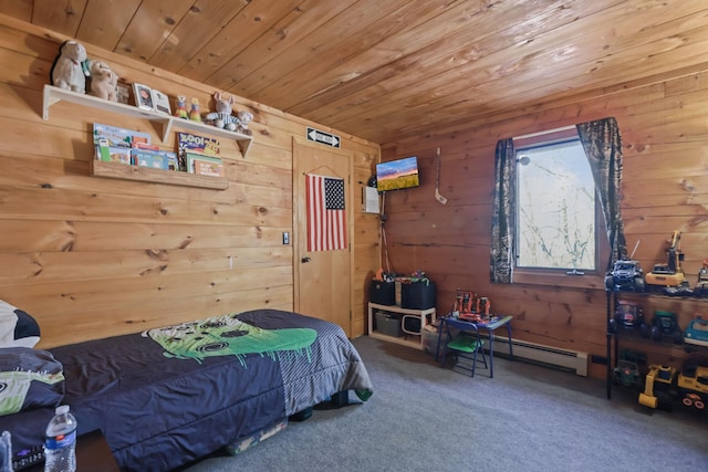 bedroom featuring a baseboard heating unit, carpet flooring, wooden ceiling, and wooden walls