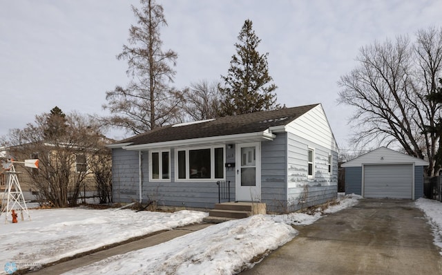 view of front of home featuring an outbuilding and a garage