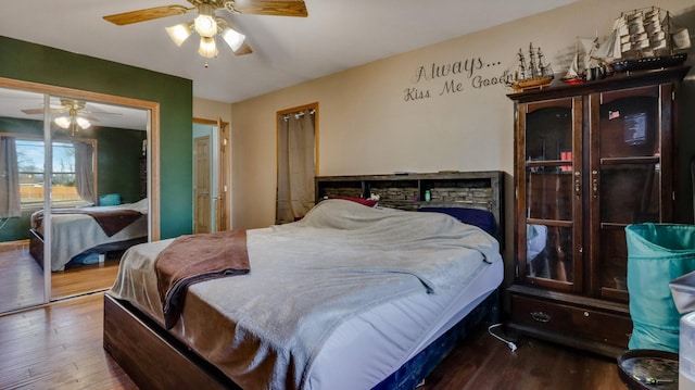 bedroom featuring wood-type flooring and ceiling fan