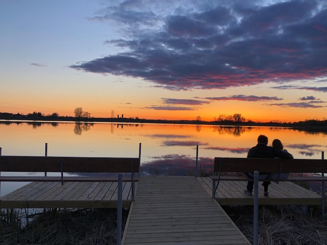 view of dock with a water view