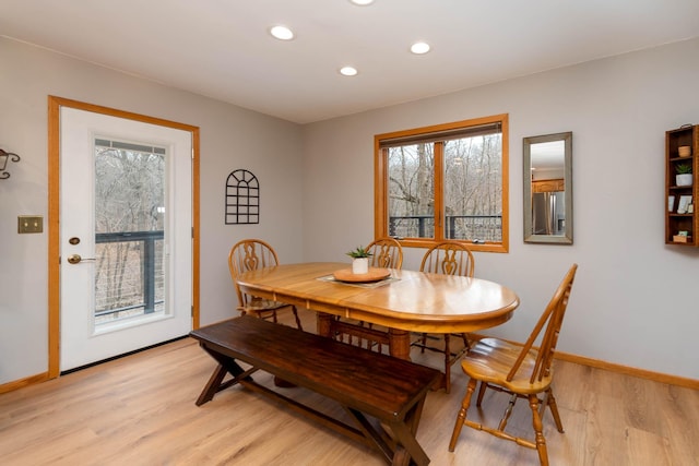 dining space featuring light hardwood / wood-style floors