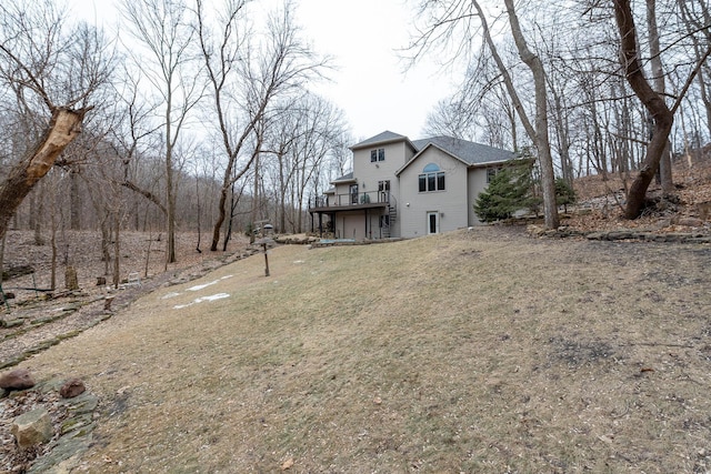 exterior space with a yard and a deck