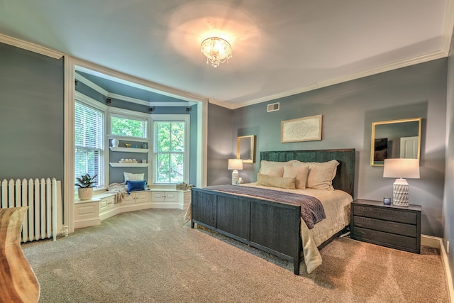 bedroom with radiator, ornamental molding, and carpet