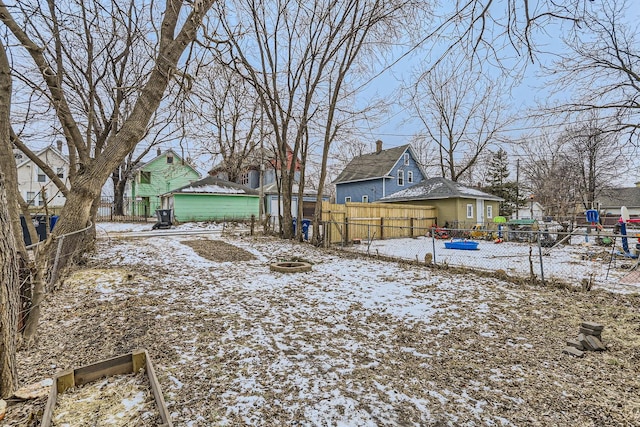 view of yard layered in snow