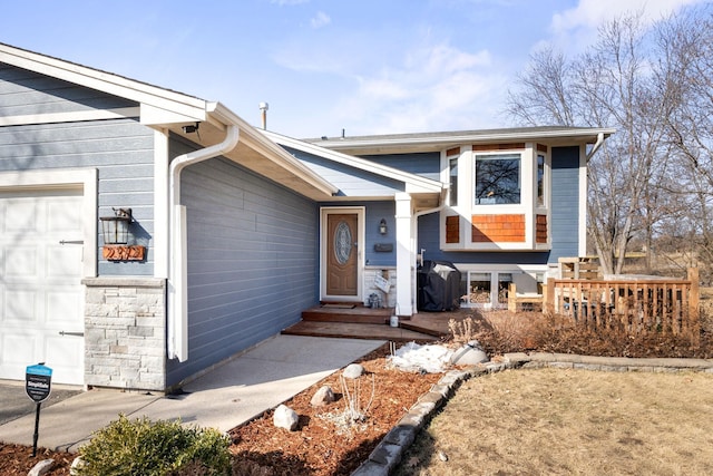 view of front of property with a garage