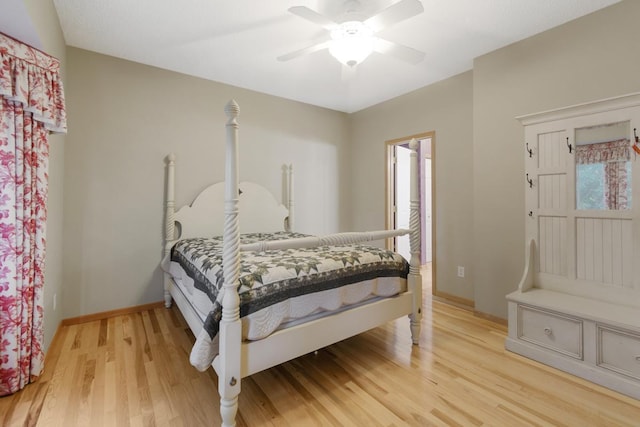 bedroom featuring ceiling fan and light hardwood / wood-style flooring