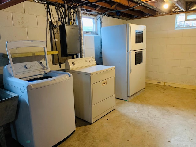 laundry room featuring washer and clothes dryer