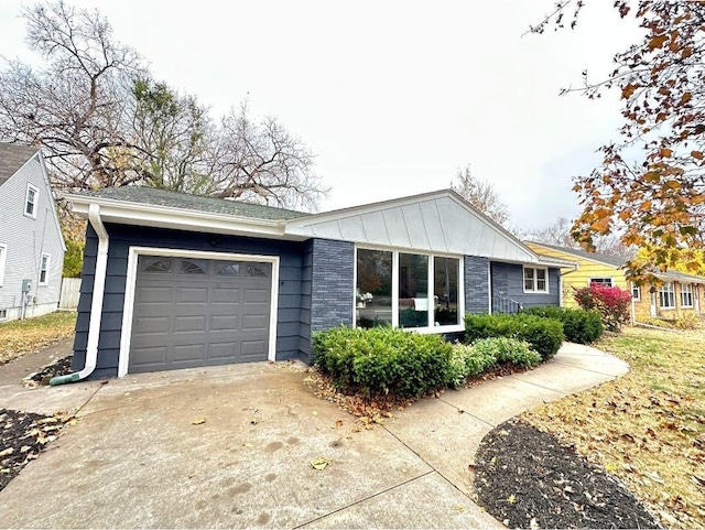 ranch-style home with a garage