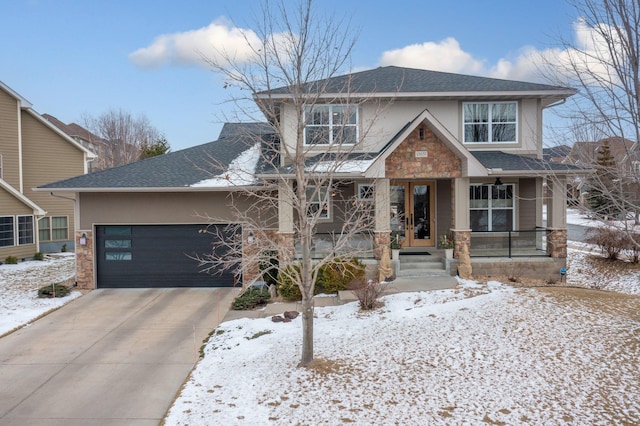 view of front facade featuring a garage and covered porch