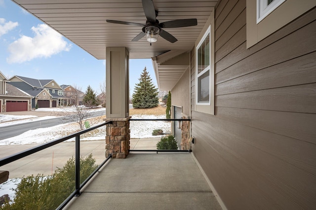 balcony featuring ceiling fan and covered porch