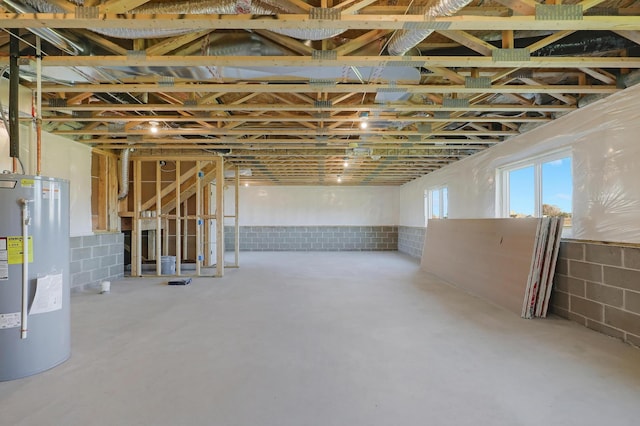 basement featuring electric water heater