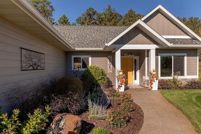 property entrance with a yard