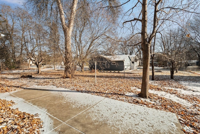 view of yard covered in snow