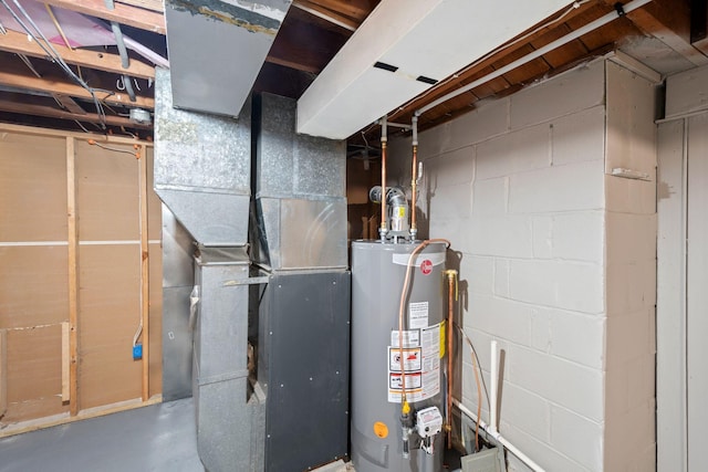 utility room featuring water heater