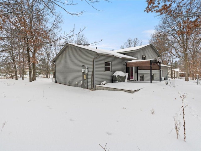 view of snow covered property