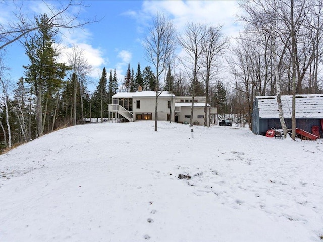 view of yard covered in snow