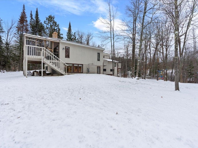 view of snow covered property