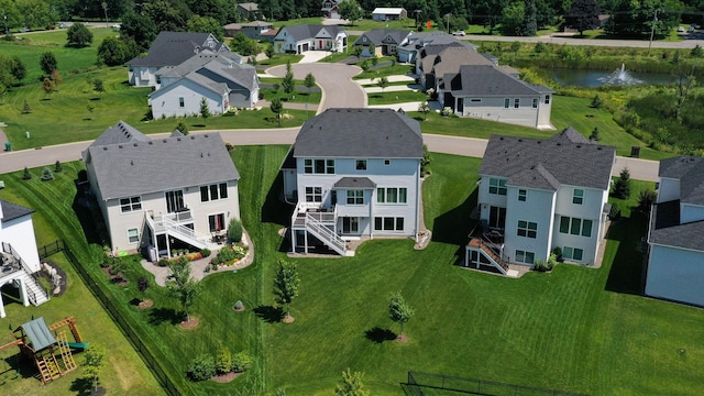 drone / aerial view featuring a water view