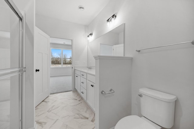 full bath featuring toilet, marble finish floor, and vanity