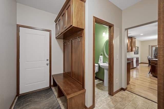 mudroom featuring baseboards