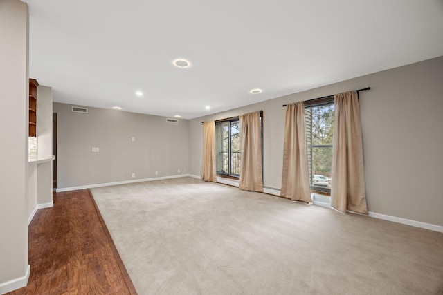 9700 Portland Ave S Unit 226, Bloomington, MN 55420 - carpeted spare room featuring baseboards and recessed lighting