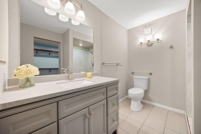 9700 Portland Ave S Unit 226, Bloomington, MN 55420 - bathroom featuring vanity, toilet, baseboards, a shower, and tile patterned floors