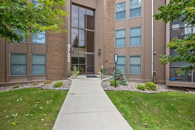 9700 Portland Ave S Unit 226, Bloomington, MN 55420 - entrance to property with a lawn