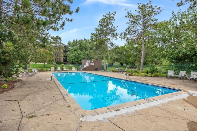 9700 Portland Ave S Unit 226, Bloomington, MN 55420 - community pool with a patio and view of scattered trees