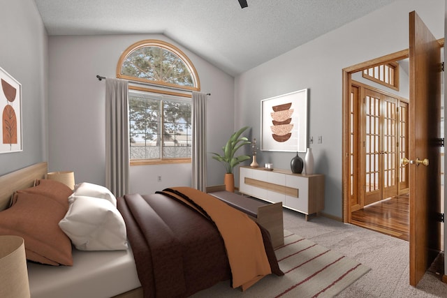 bedroom with lofted ceiling, carpet flooring, and a textured ceiling