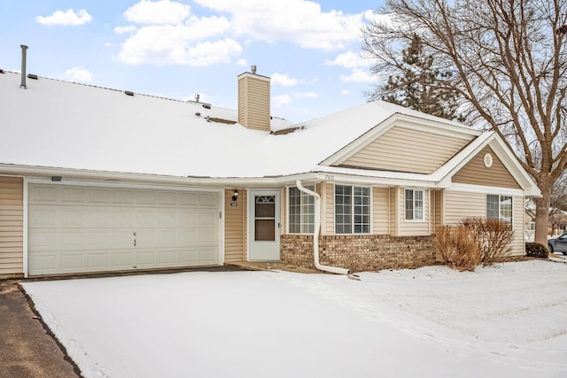 view of front of home featuring a garage