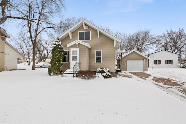 bungalow-style home with an outbuilding and a garage