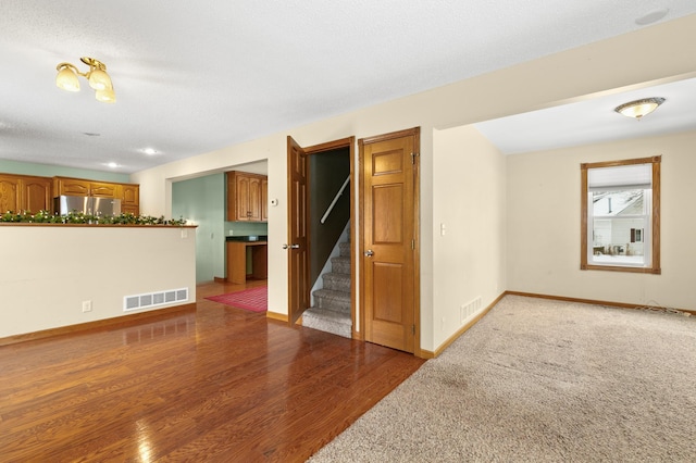 unfurnished room featuring wood-type flooring