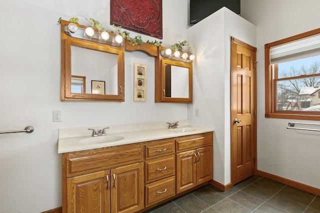 bathroom with vanity and tile patterned flooring