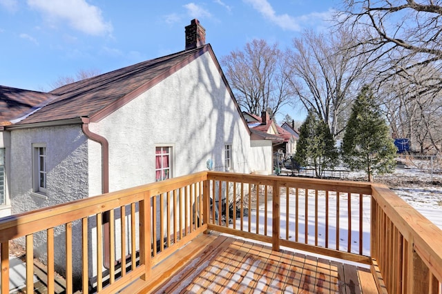 view of snow covered deck