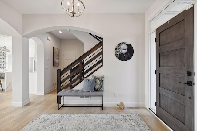 foyer with light hardwood / wood-style flooring