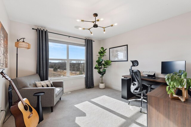 carpeted office with an inviting chandelier