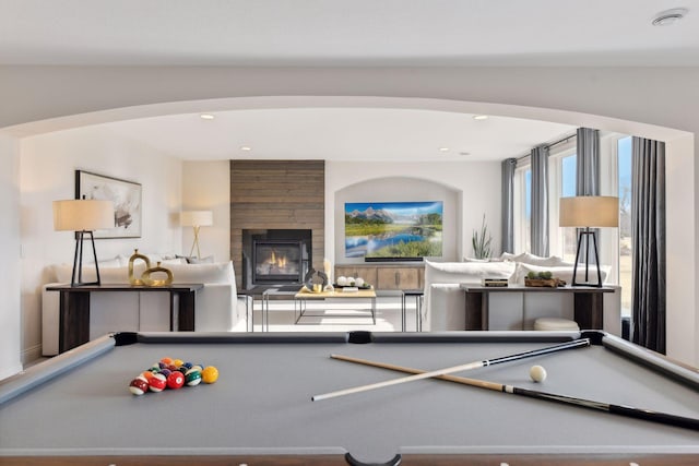 rec room featuring a fireplace and billiards