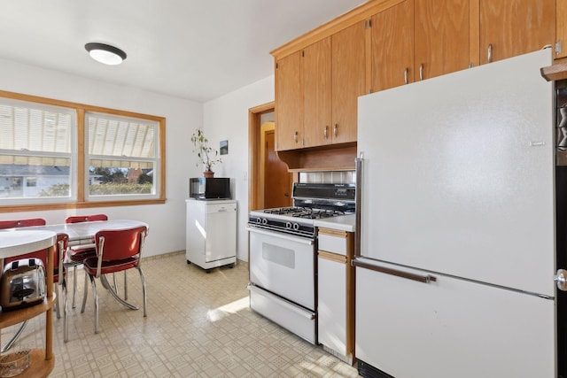 kitchen featuring white appliances