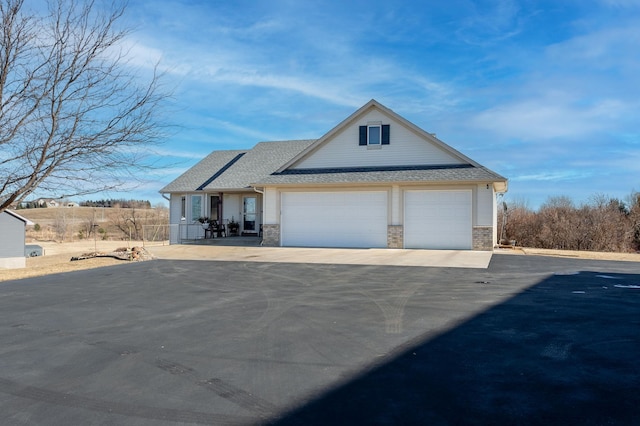 view of front of home featuring a garage