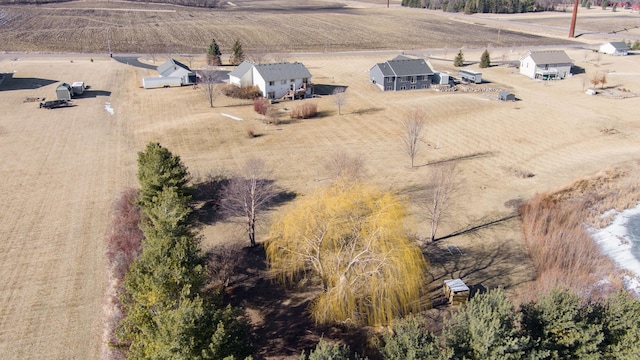 birds eye view of property featuring a rural view