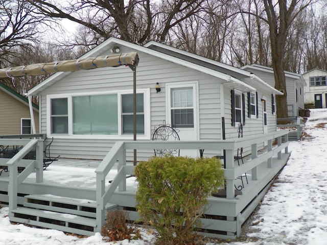 view of snow covered property