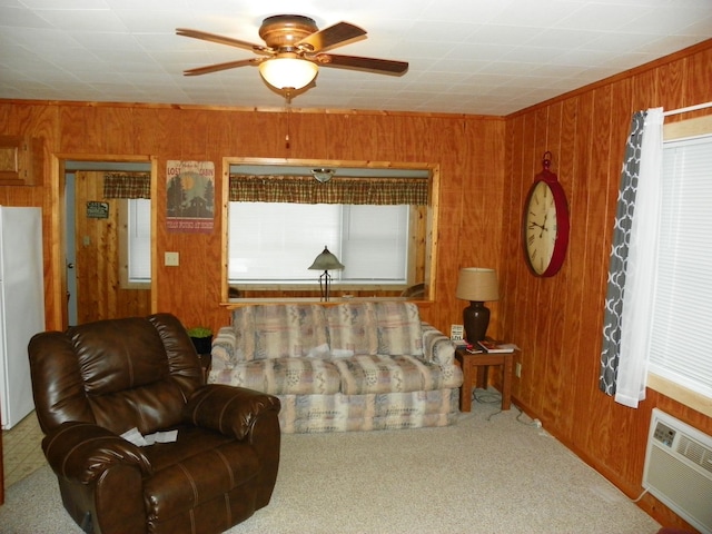 living room with ceiling fan, wooden walls, and a wall mounted AC