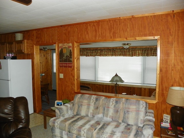 living room featuring wooden walls