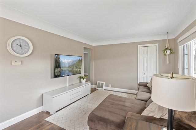 living room with dark wood-type flooring