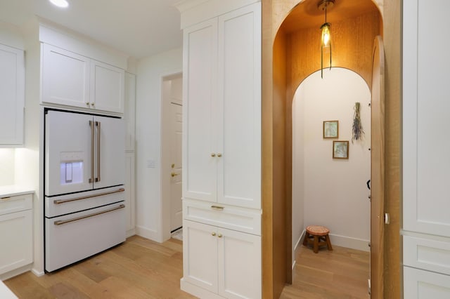 hallway with light wood-type flooring