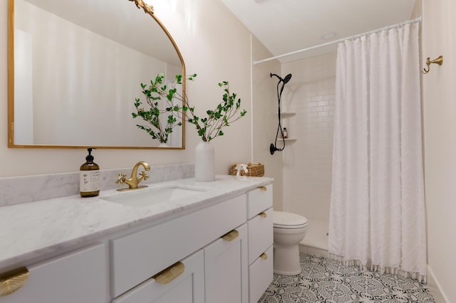 bathroom featuring vanity, tile patterned flooring, curtained shower, and toilet