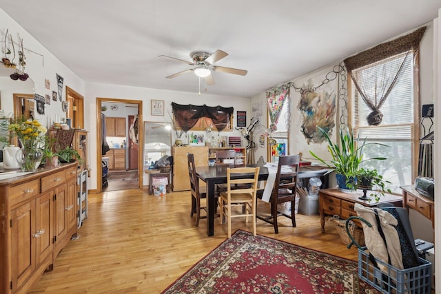 dining area featuring ceiling fan and light hardwood / wood-style floors