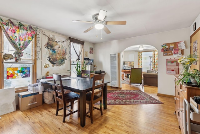 dining space featuring ceiling fan and light hardwood / wood-style floors