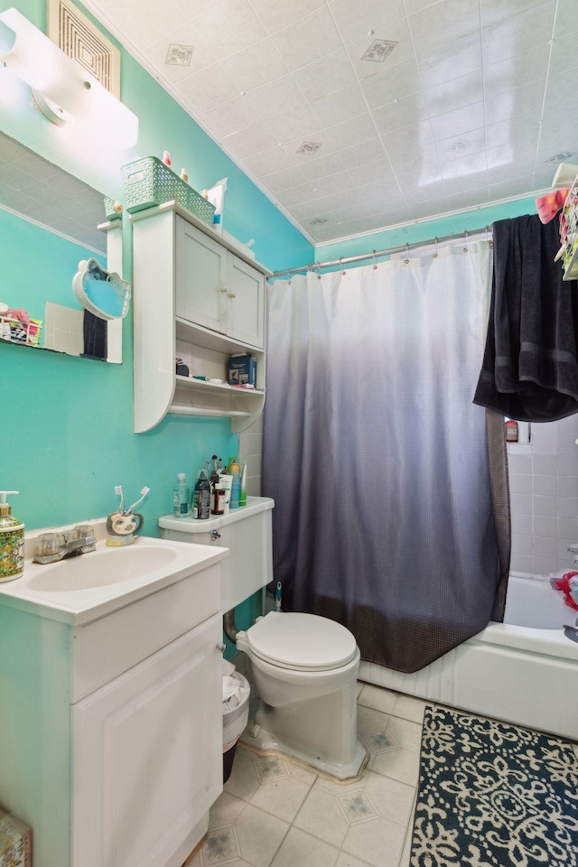 full bathroom with shower / bathtub combination with curtain, vanity, tile patterned flooring, and toilet